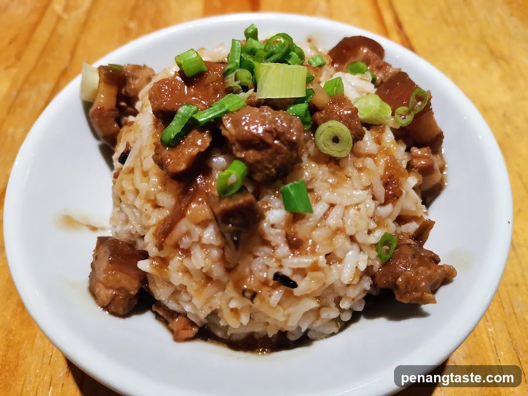 Rice dish with meat and green onions