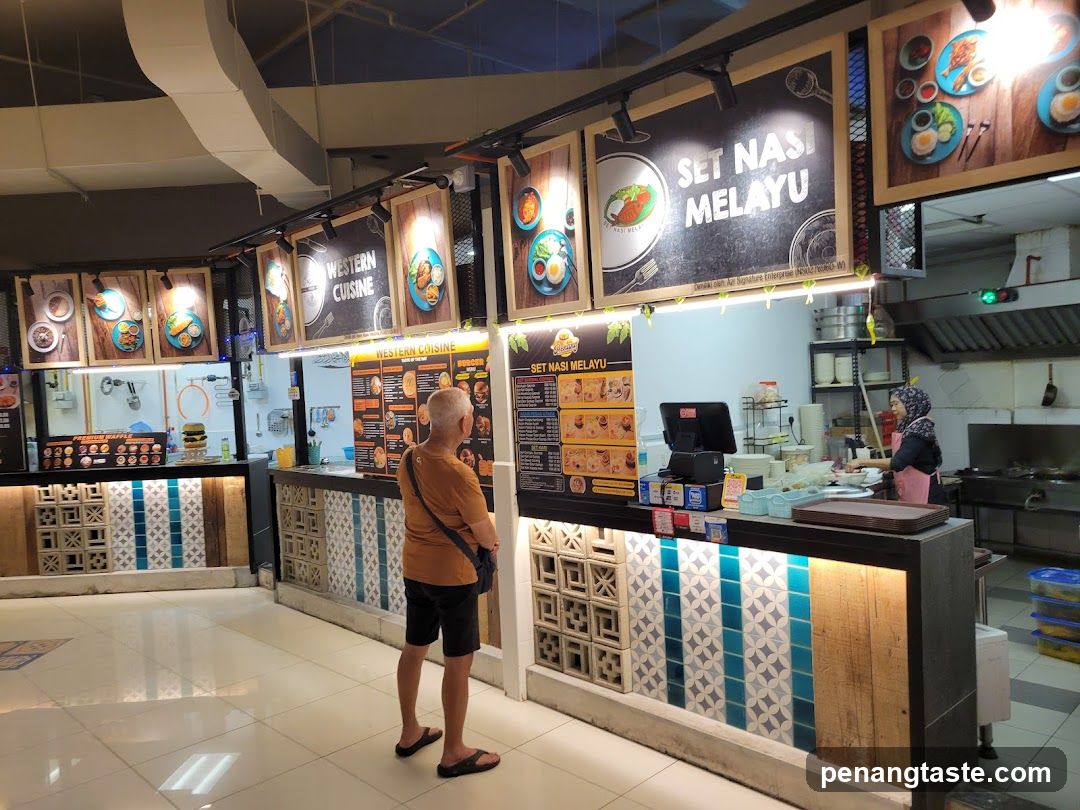 Food court interior with Malay and Western cuisine stalls
