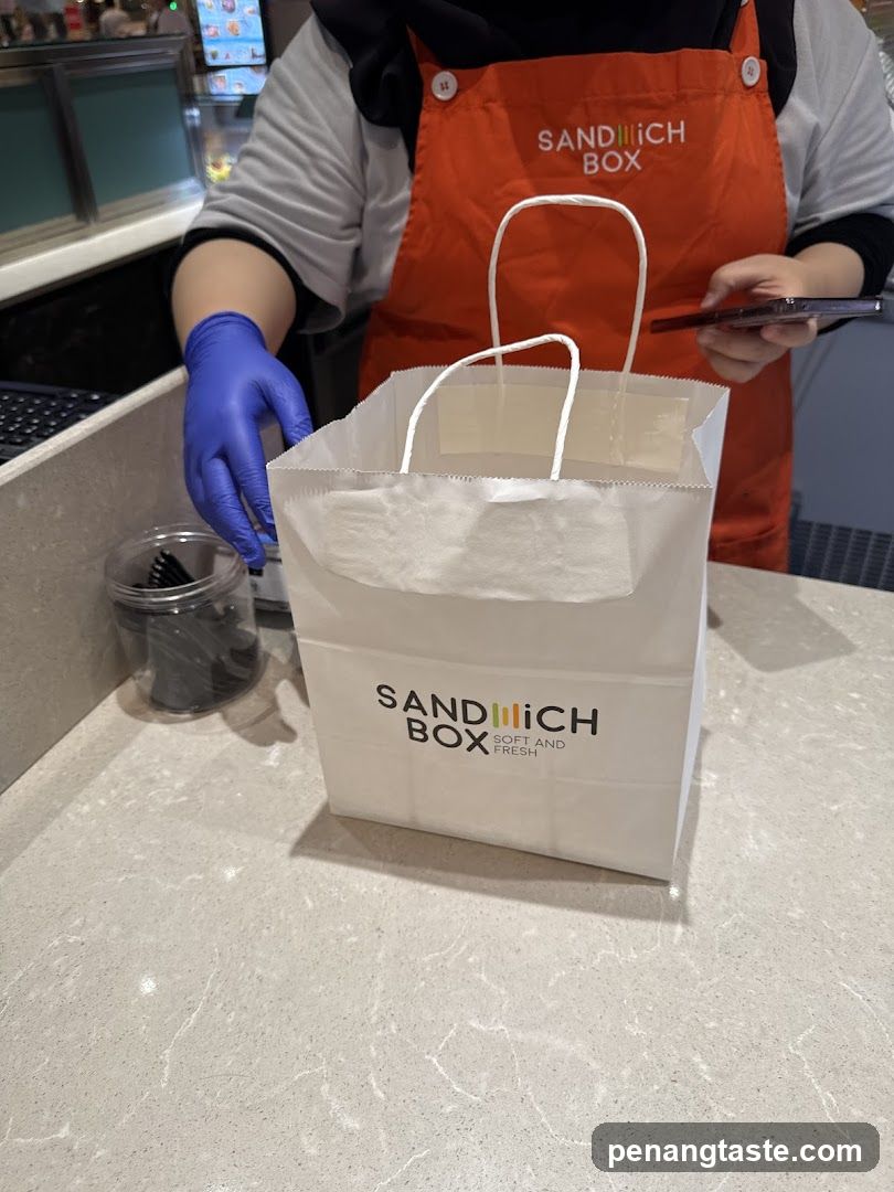 Sandwich Box Staff at Counter