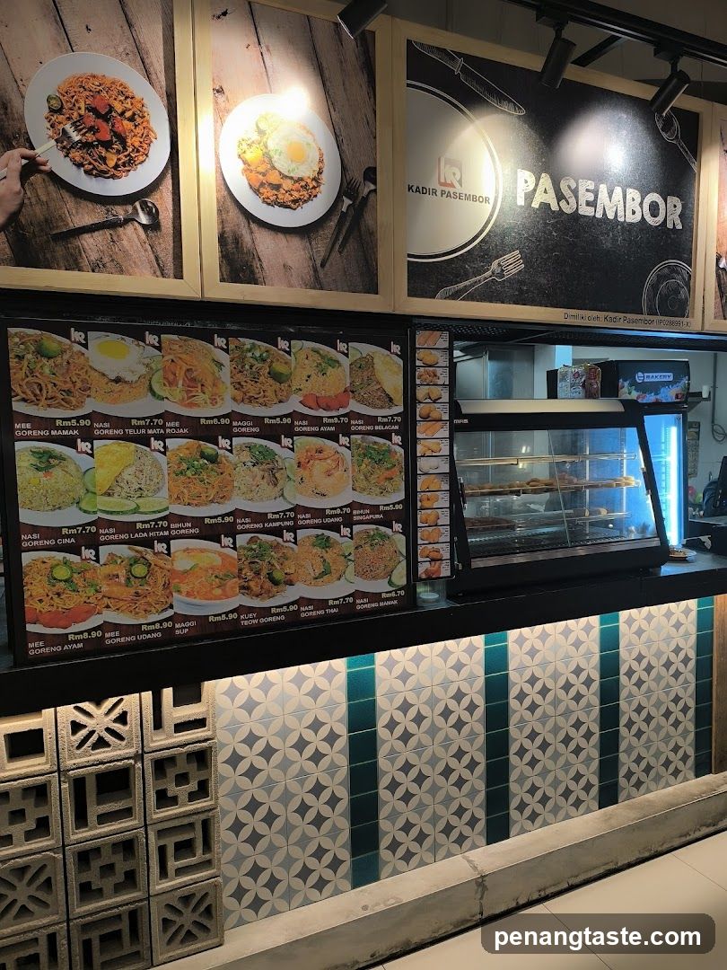 Restaurant interior with menu board and display case