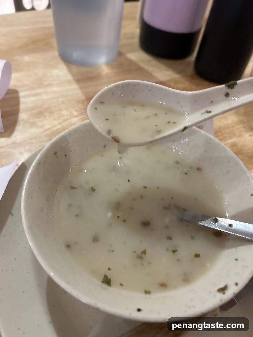 Soup in bowl with spoon