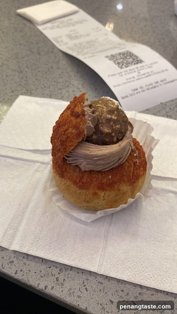 Pastry on counter with receipt