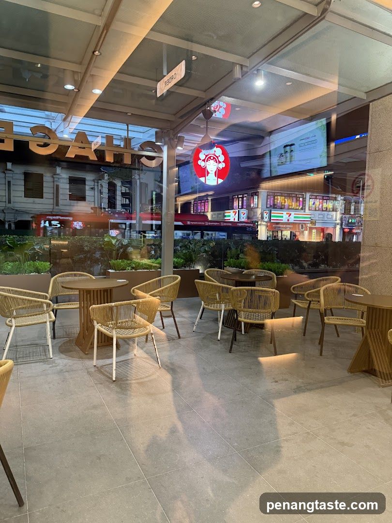 Outdoor seating area with glass facade