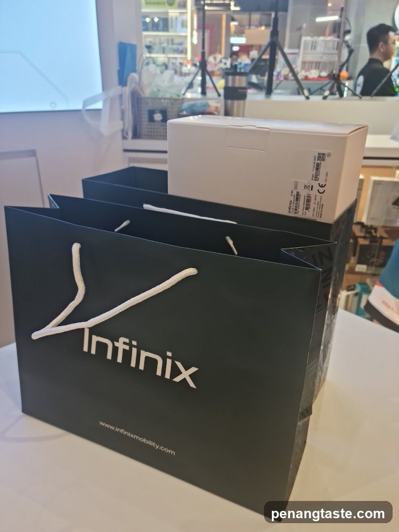 Infinix Shopping Bag and Product Box