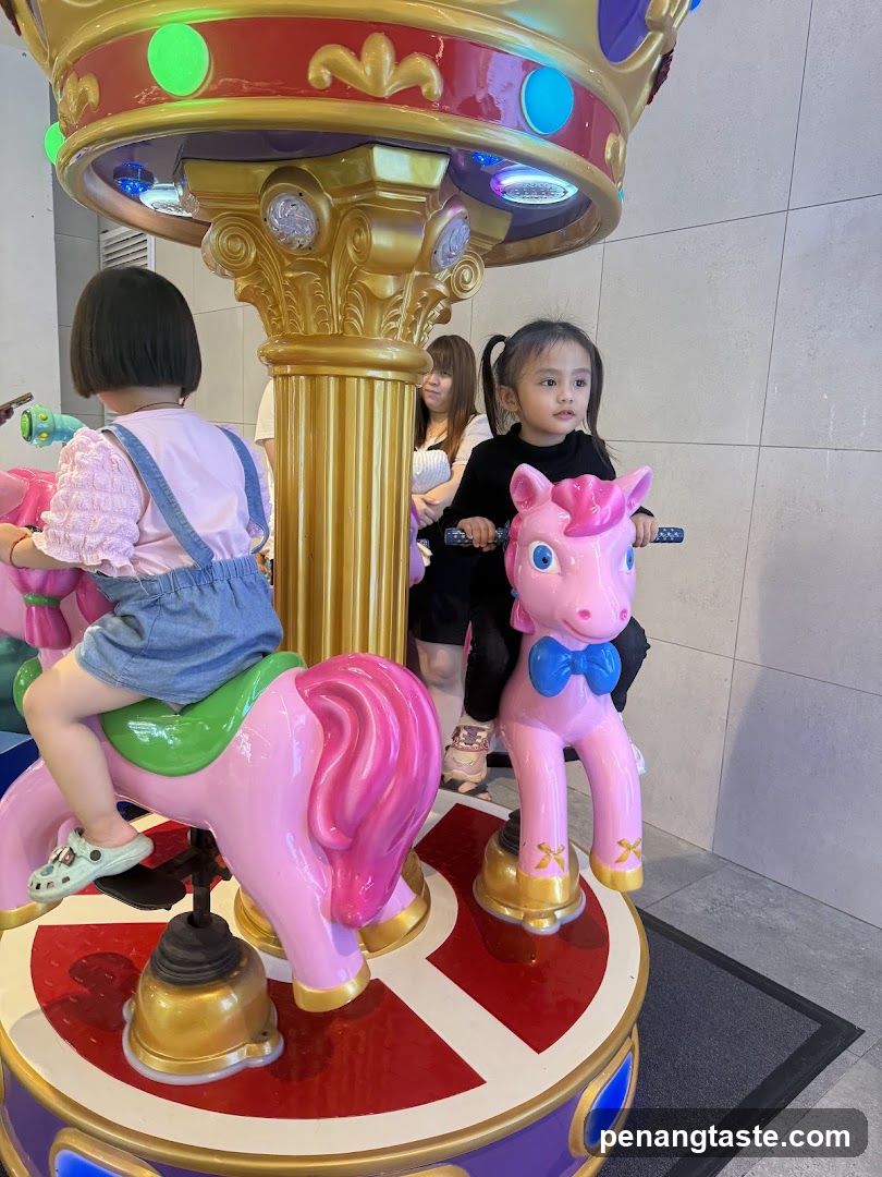 Children on carousel ride