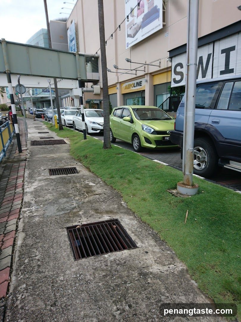 Street Scene with Parked Cars and Storefronts