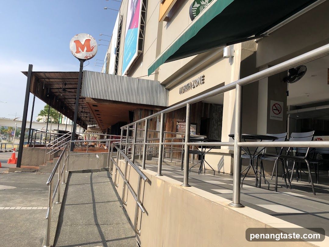 Outdoor Cafe Entrance with Signage