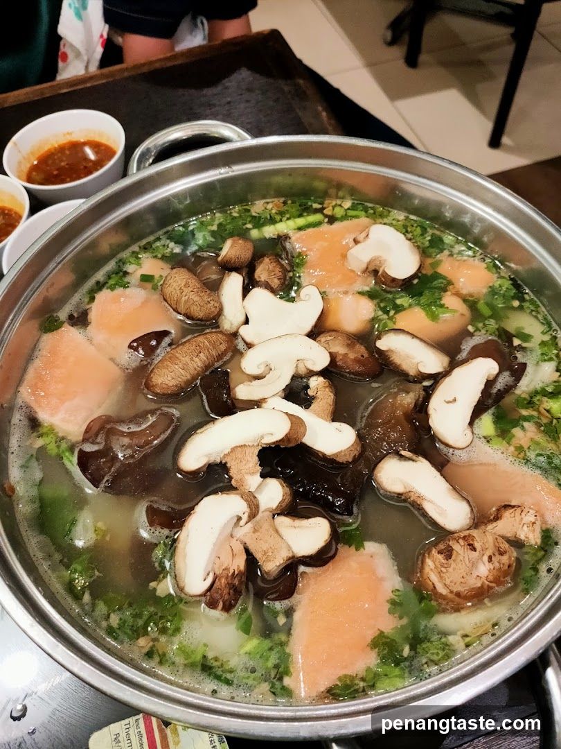 Hot Pot with Mushrooms and Fish