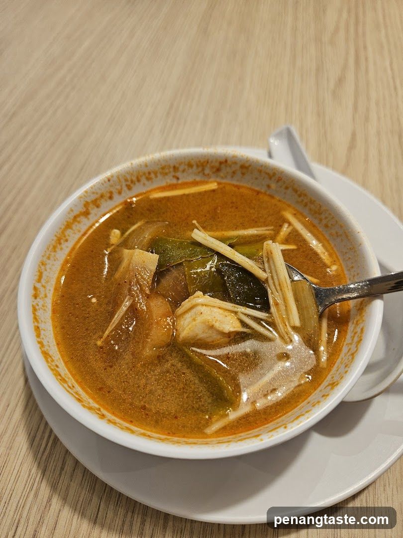 Bowl of Curry Soup with Vegetables and Tofu