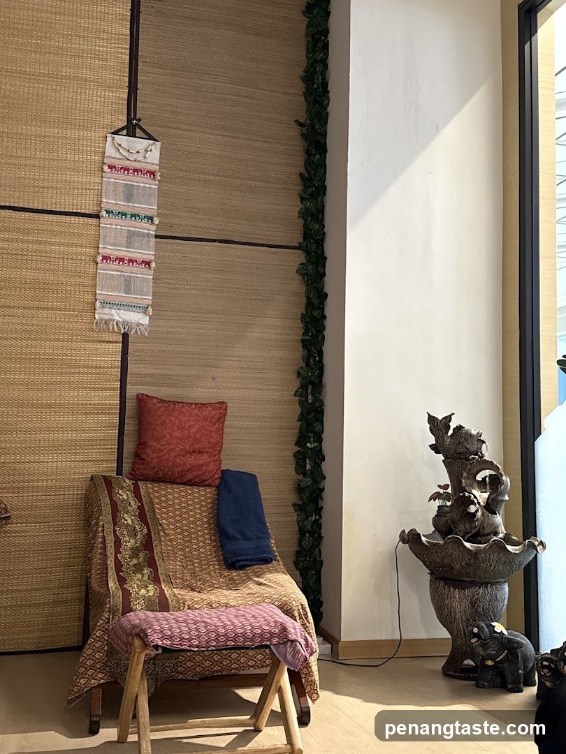 Interior Decor with Cushioned Chair and Sculpture