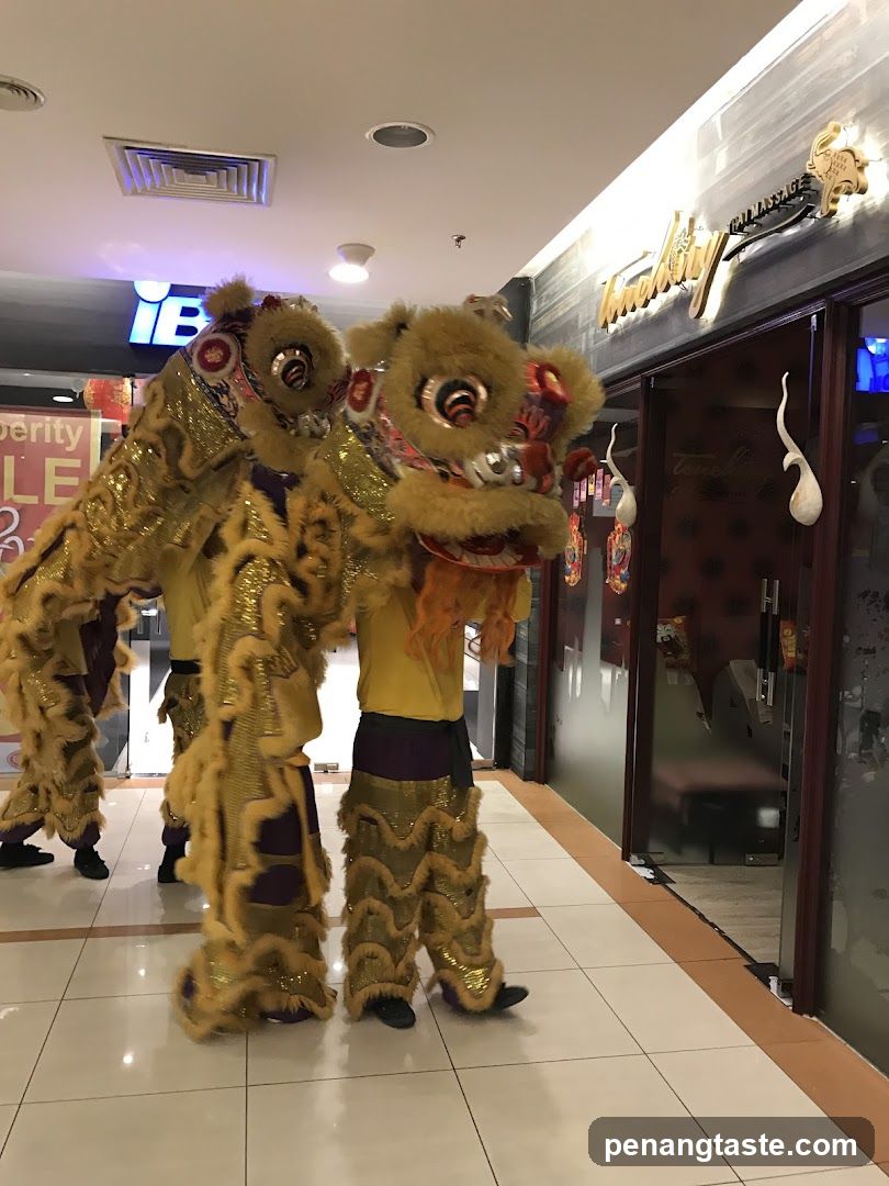 Lion Dance Performance in Mall Corridor