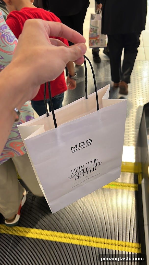 Shopping Bag on Moving Walkway
