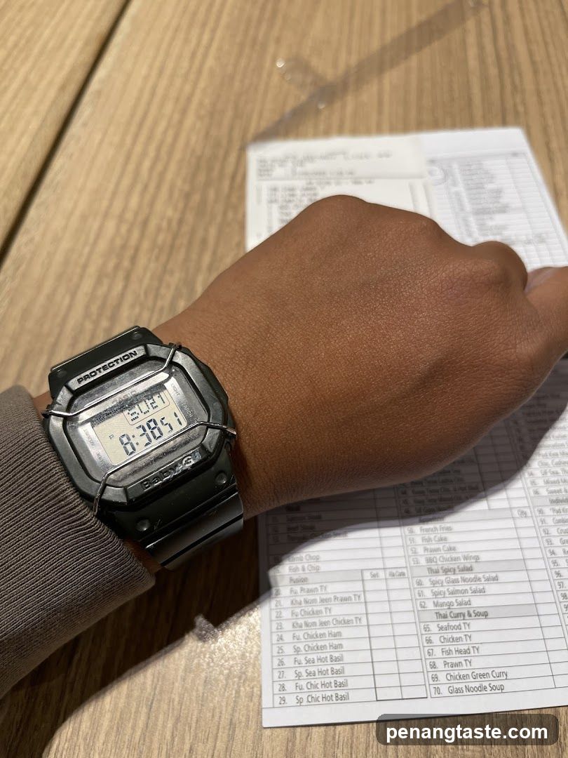 Watch and Menu on Table