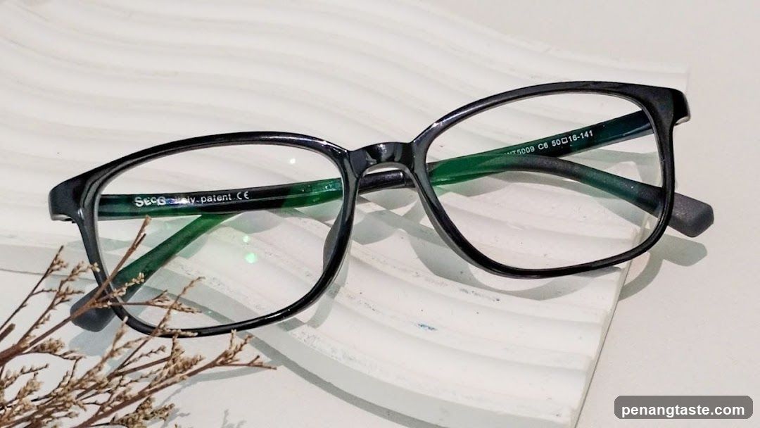 Eyeglasses on a white surface