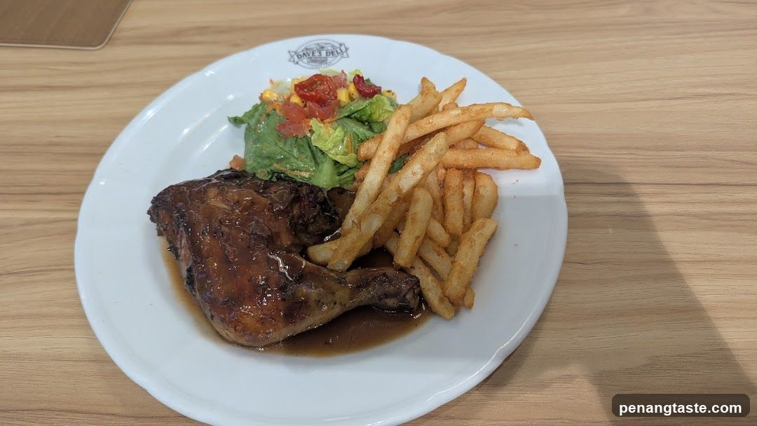 Plate of Chicken with Fries and Salad