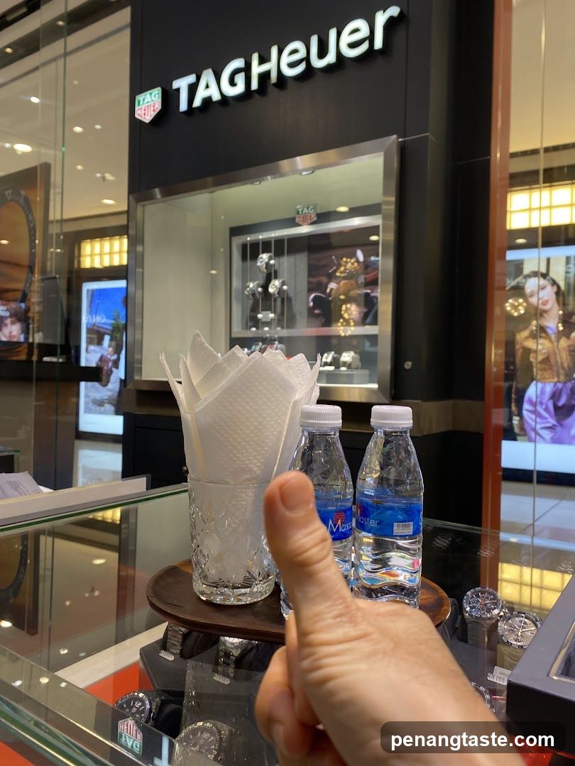 TAG Heuer Store Interior with Water Bottles and Napkins