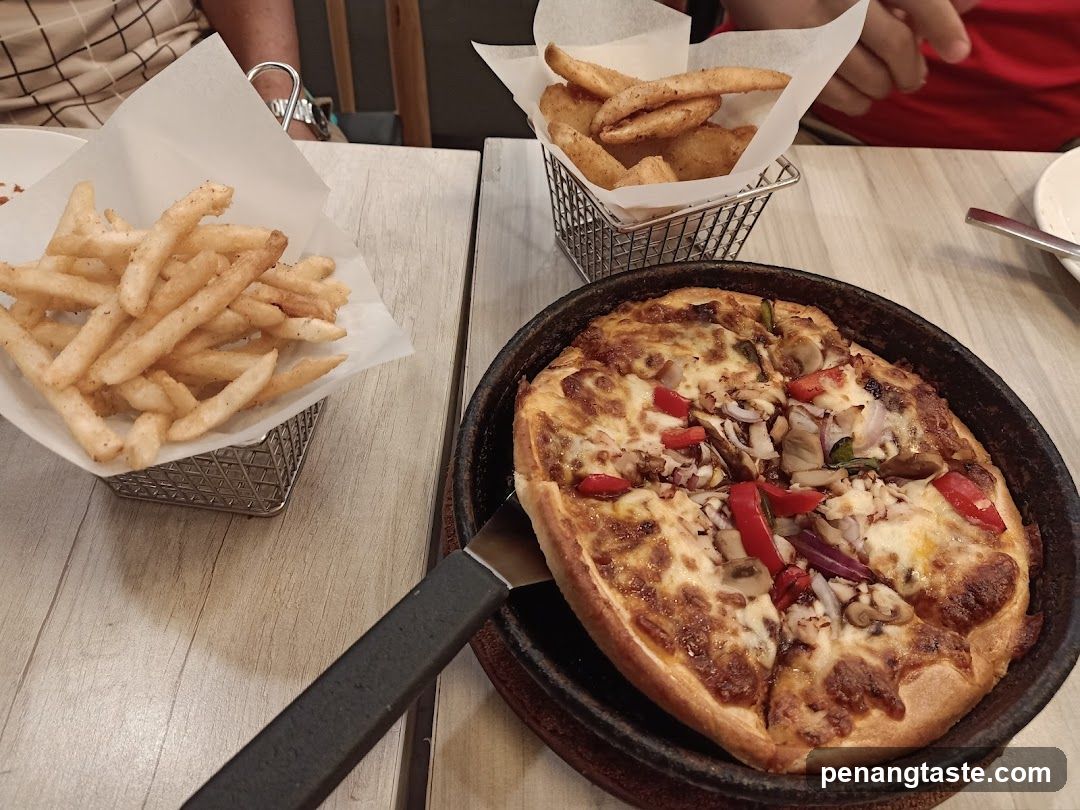 Pizza and Fries at Restaurant