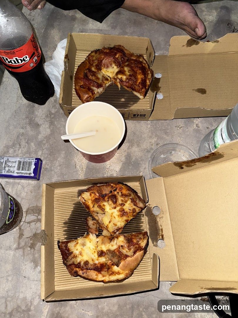 Pizza and Drinks on Concrete