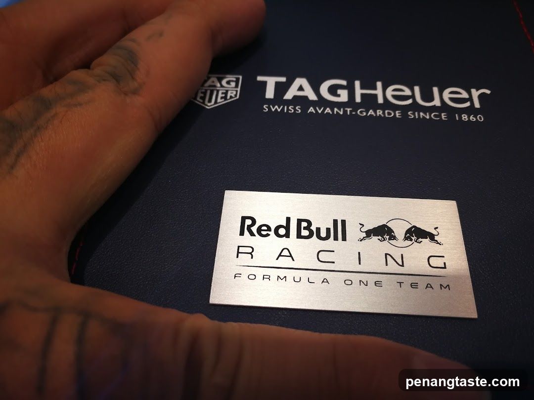 Red Bull Racing and TAG Heuer branding on a branded surface