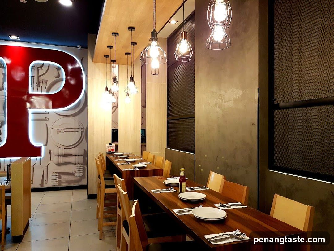 Restaurant Interior with Pendant Lights and Large Lettering