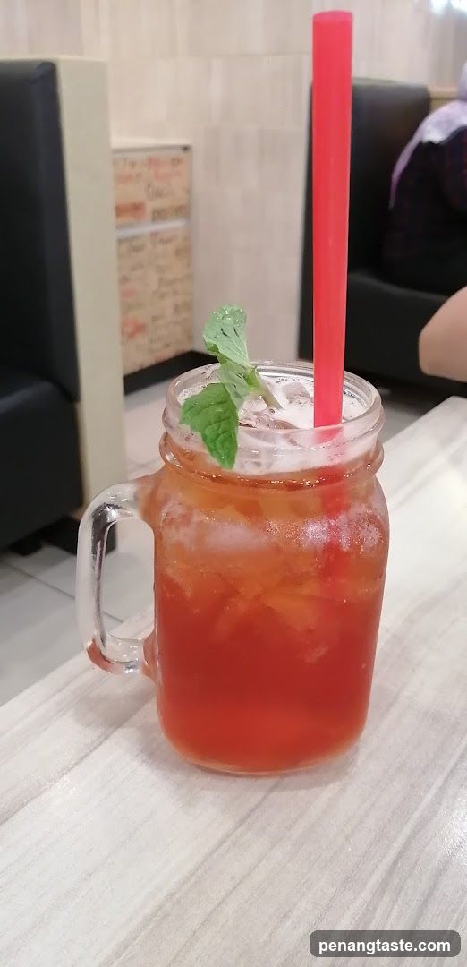 Red Iced Drink in Mason Jar Mug