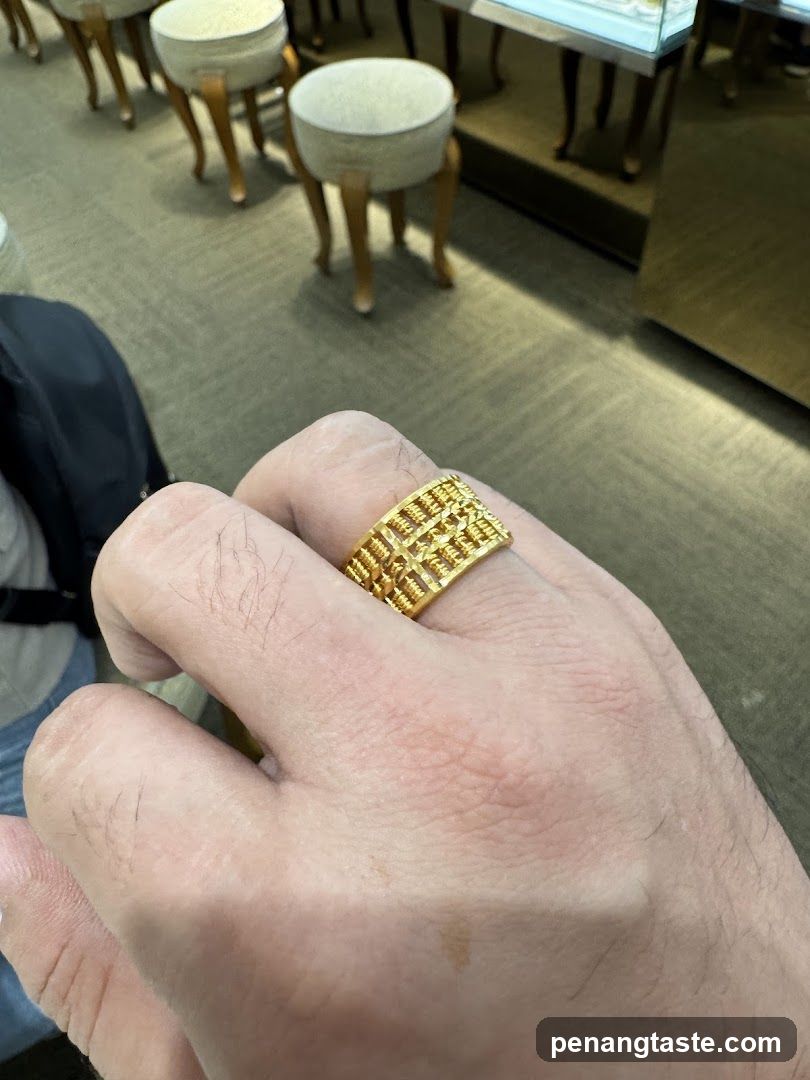 Gold Ring on Finger in Store Interior