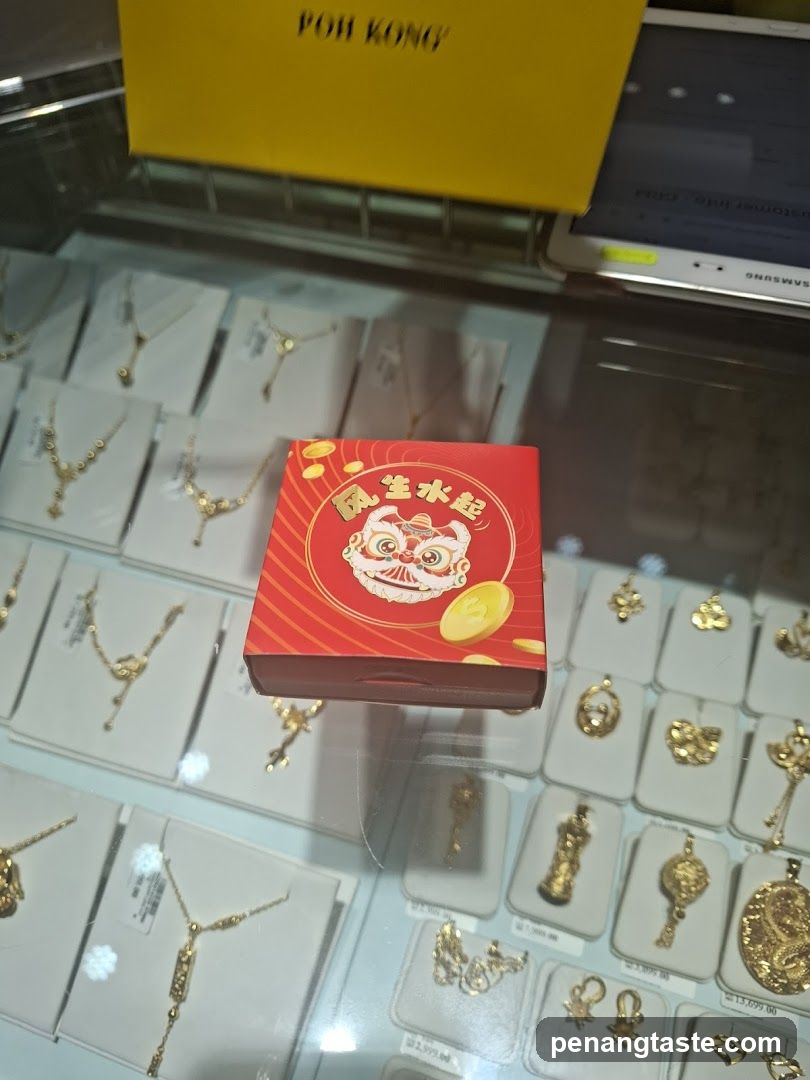 Gold Jewelry Display with Red Gift Box
