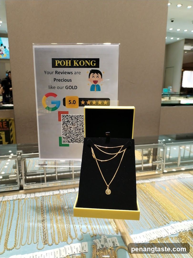 Gold Jewelry Display with Review Sign