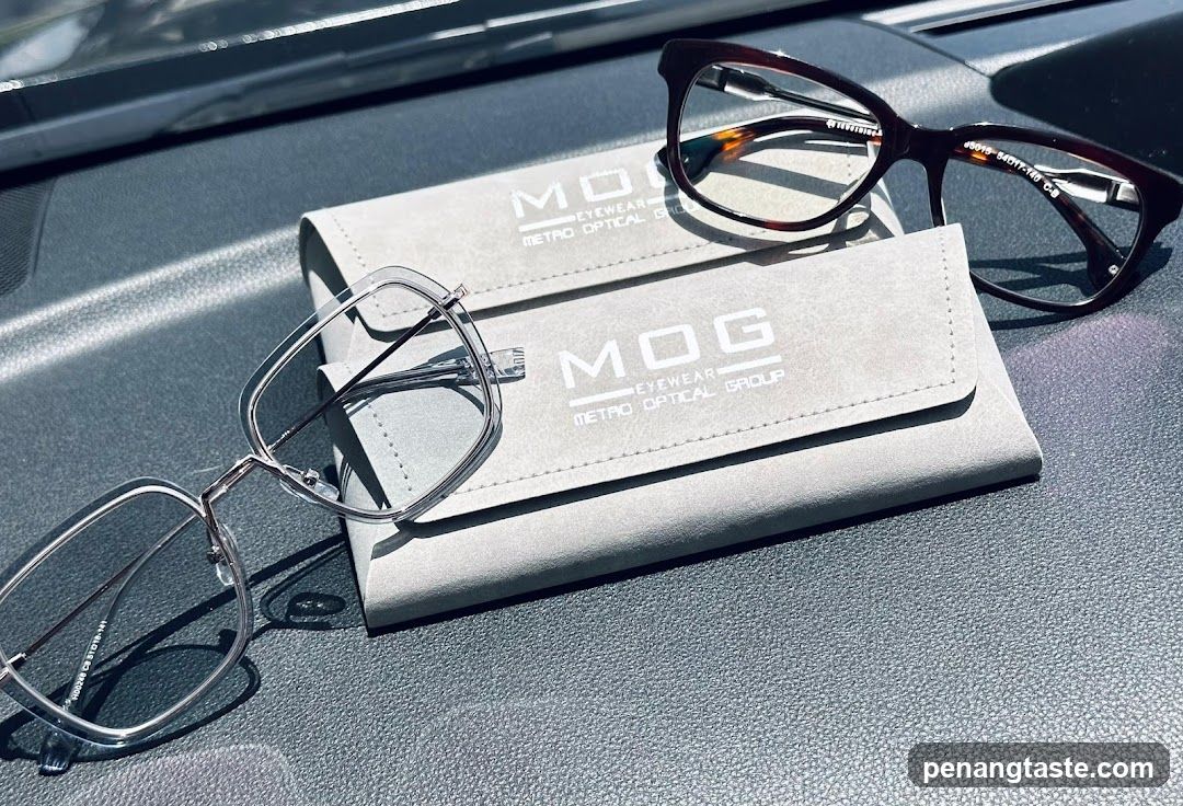Eyeglasses on car dashboard