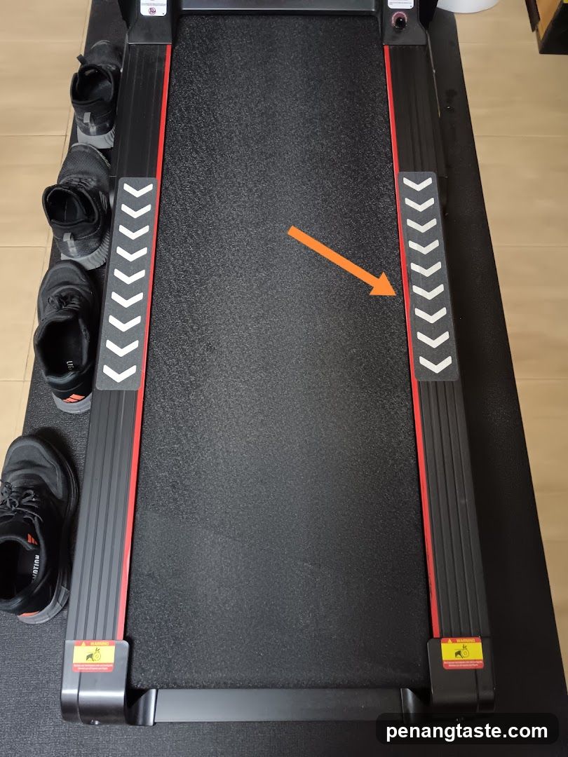 Treadmill with shoes nearby