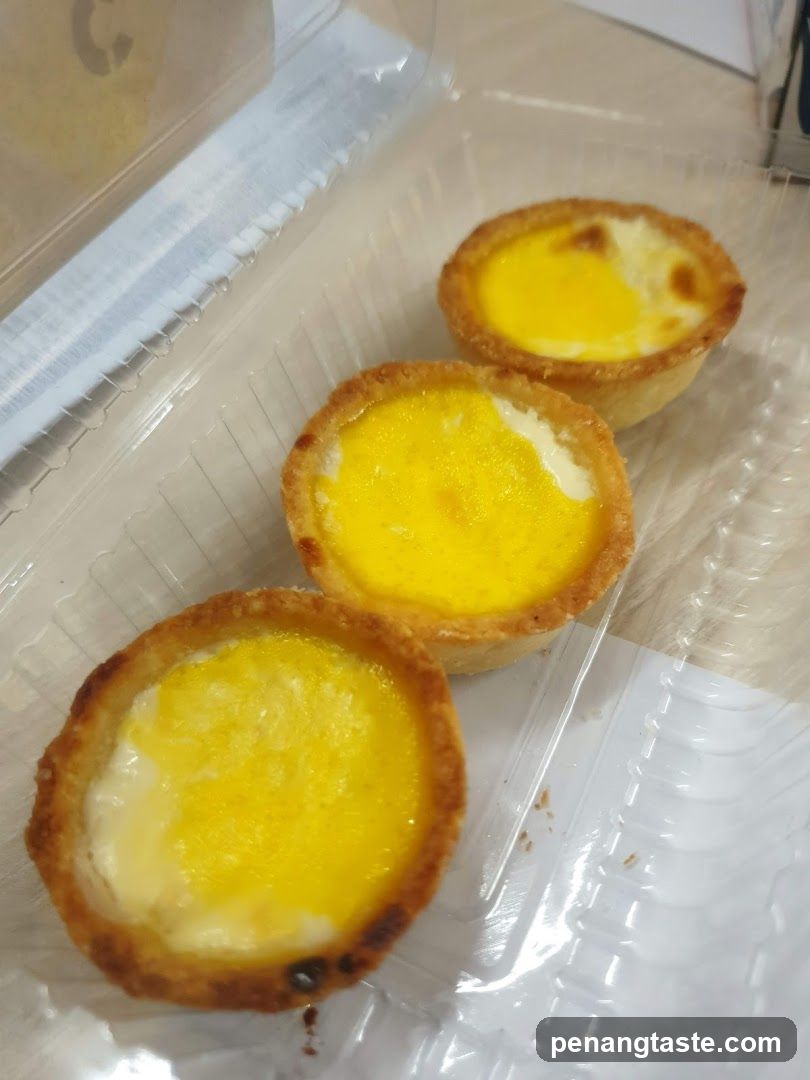 Egg Tarts in Plastic Container