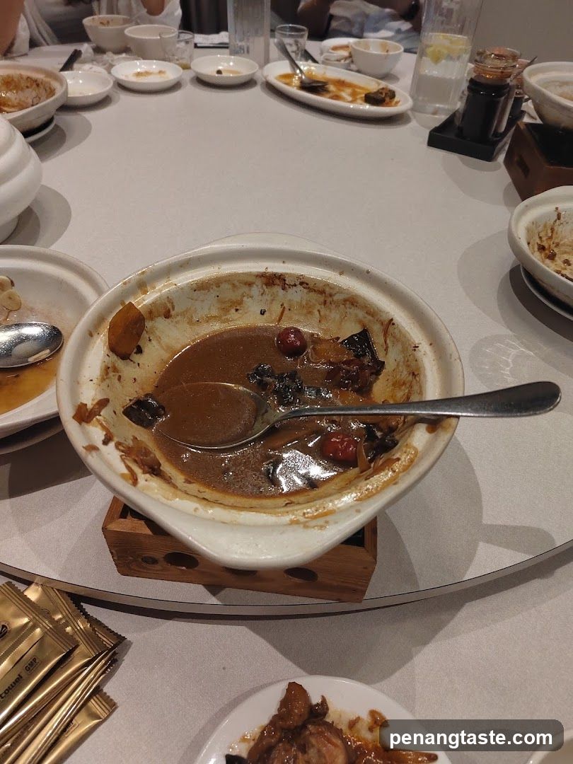 Dish in a clay pot at a restaurant table