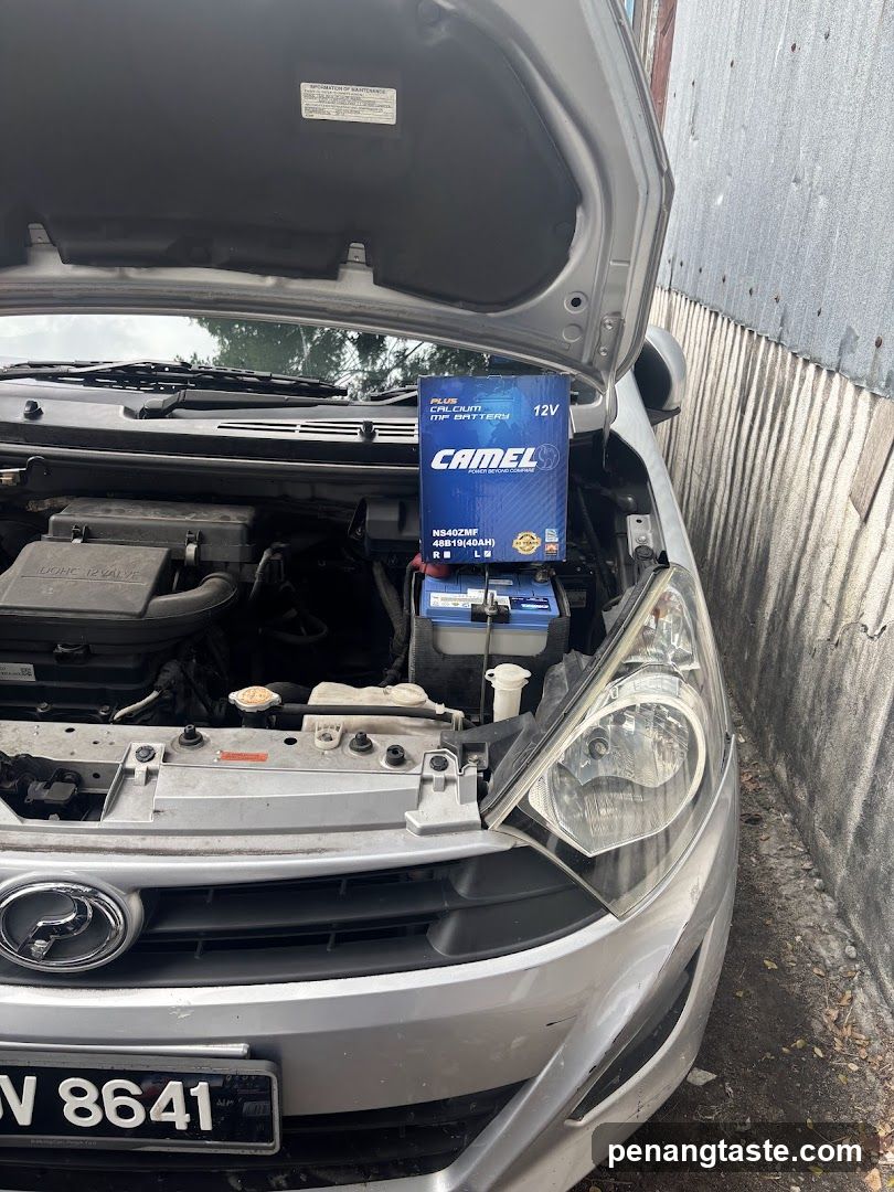 Car Engine Bay with Battery Replacement