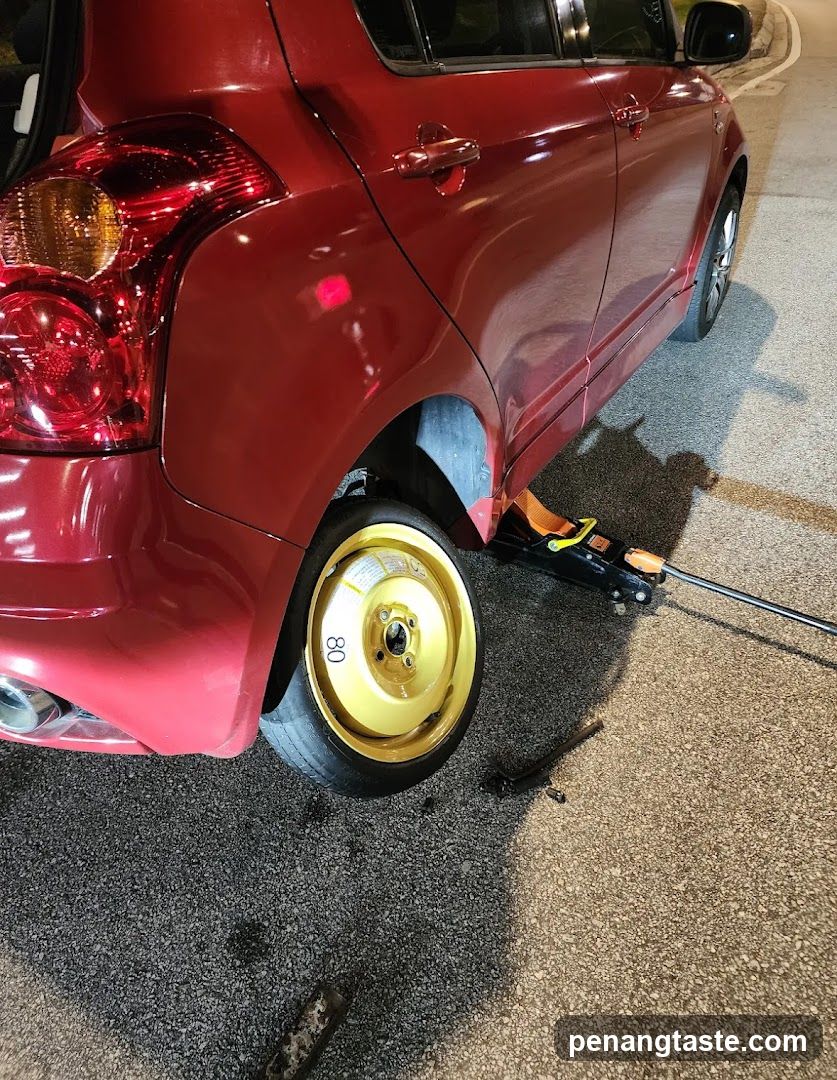 Car Jacked Up at Night