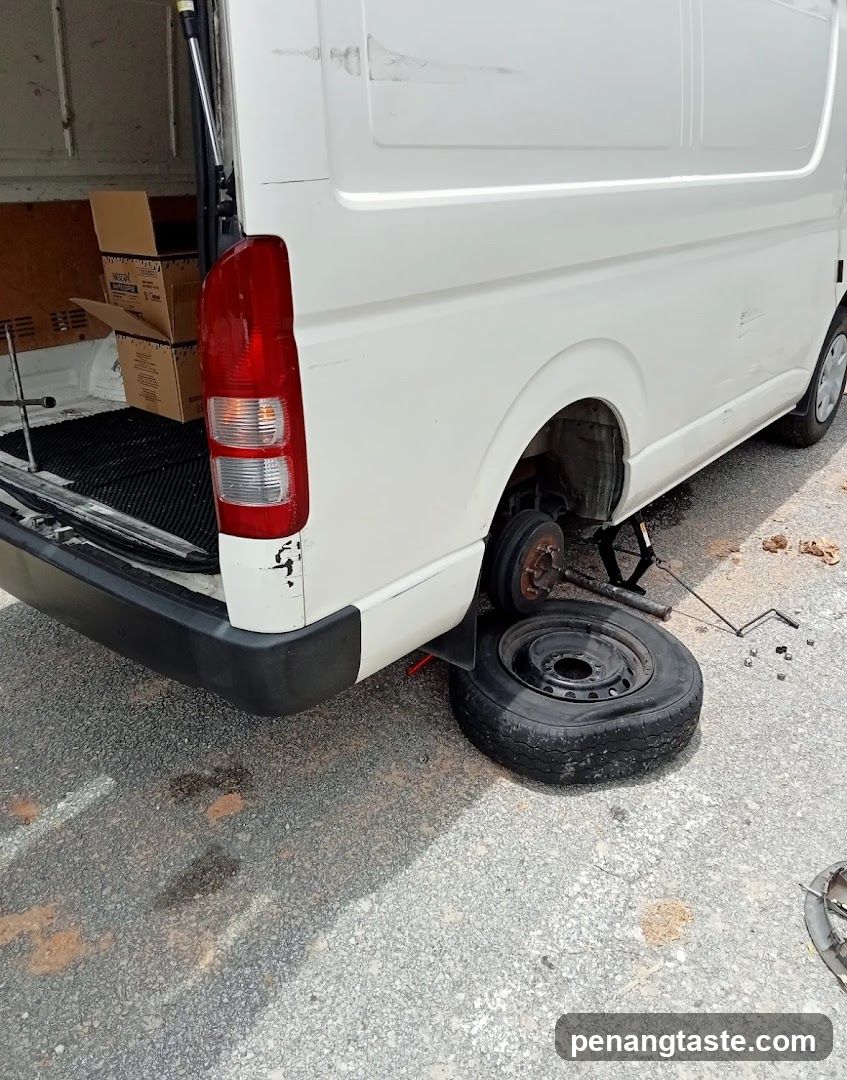 Van with Flat Tire