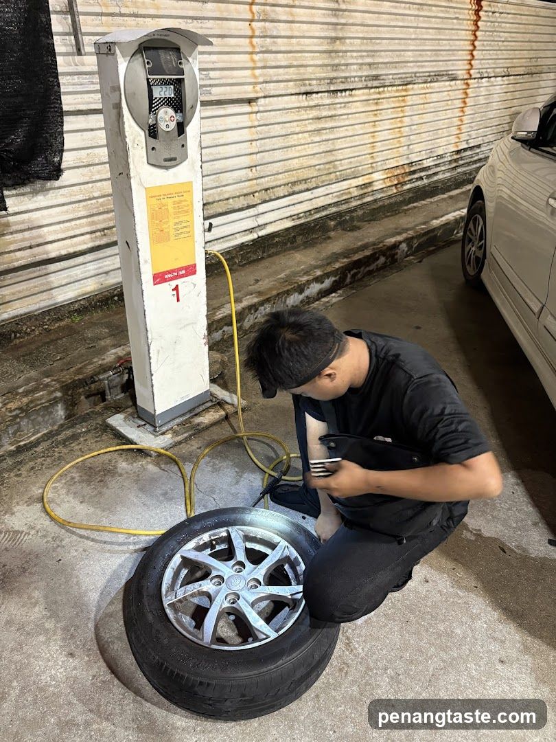 Mechanic Working on Tire