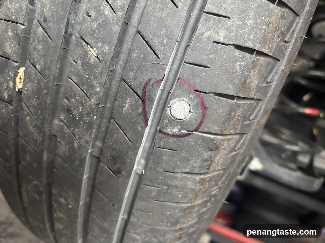 Tire with puncture repair mark