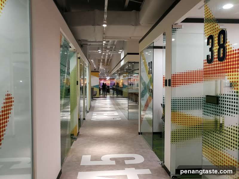 Office Corridor with Glass Partitions
