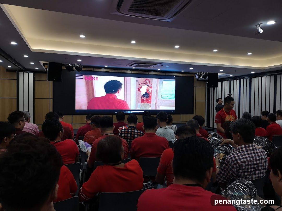 Audience watching presentation in conference room