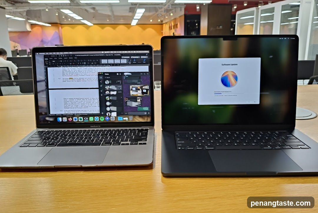 Laptops on a table in an office setting