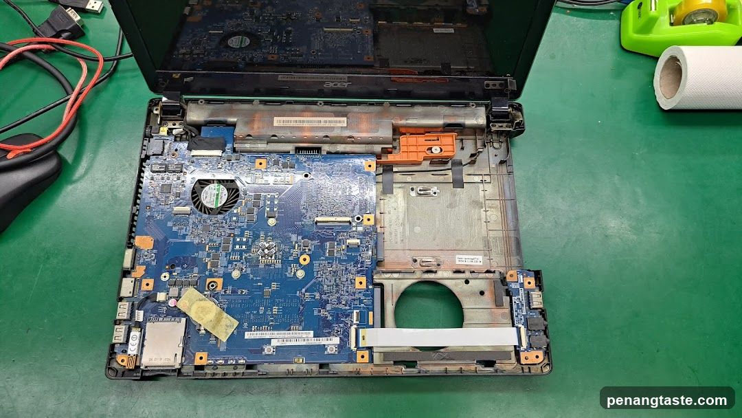 Disassembled Laptop on Workbench