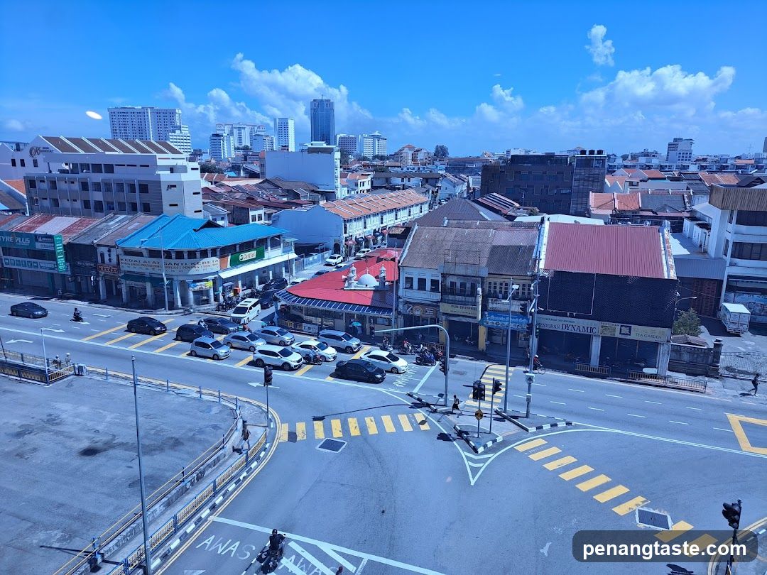City Street View with Shops and Traffic