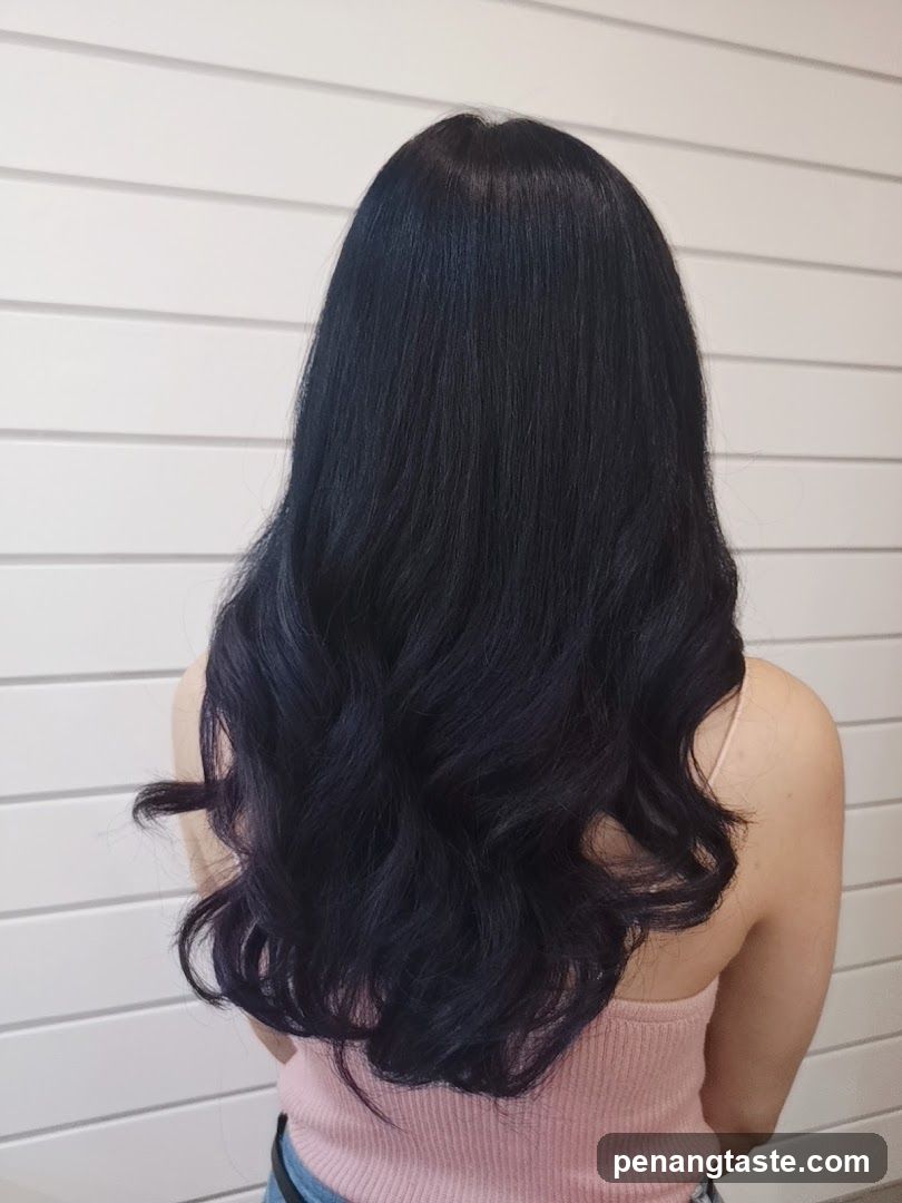 Back View of Person with Long Wavy Hair
