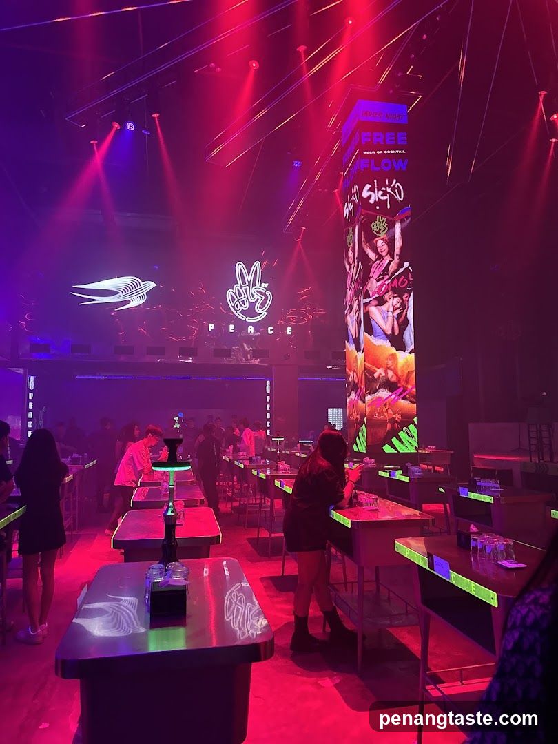 Nightclub Interior with Neon Lighting and Tables