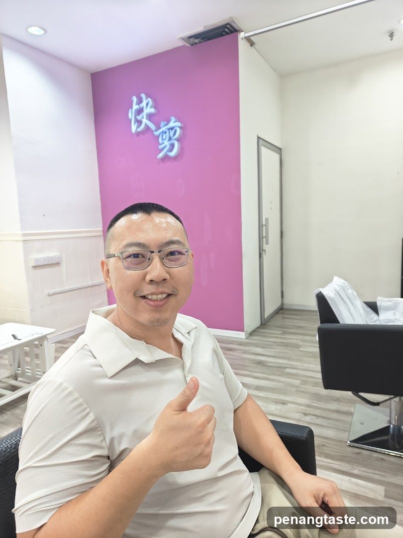 Man giving thumbs up in salon interior