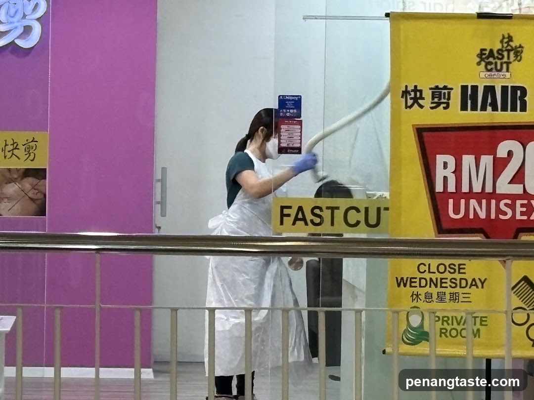 Cleaning Staff at Hair Salon Entrance