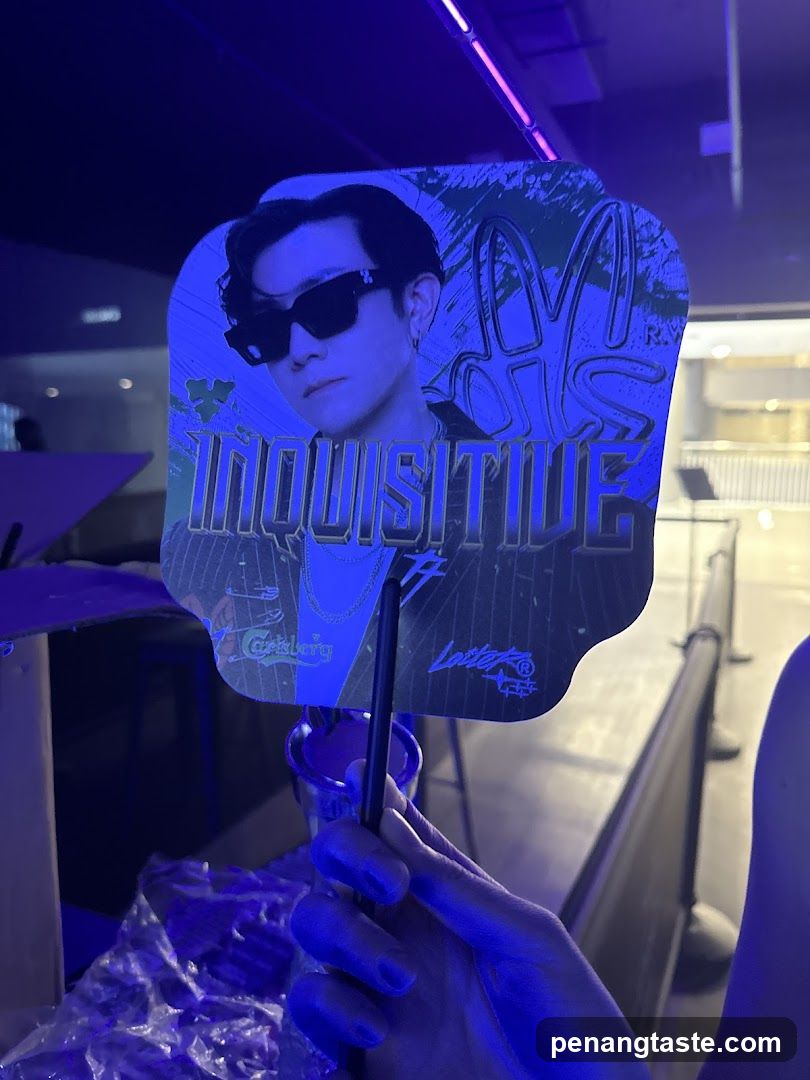 Fan-held promotional sign at event venue