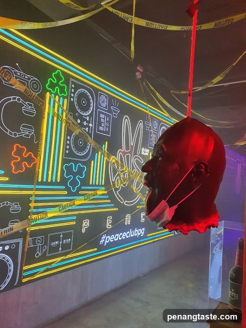 Neon Club Interior with Hanging Head Sculpture