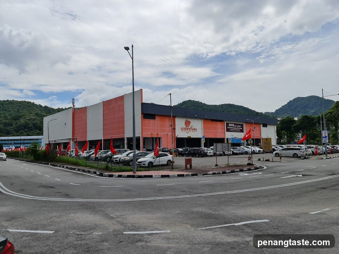 Car Dealership Exterior with Parking Lot