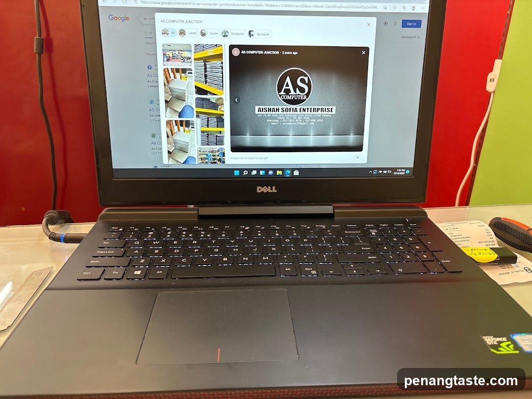 Dell Laptop Displaying Business Website